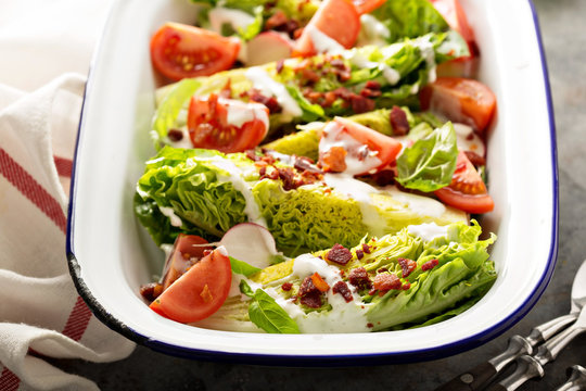 Wedge salad with baby lettuce and tomatoes