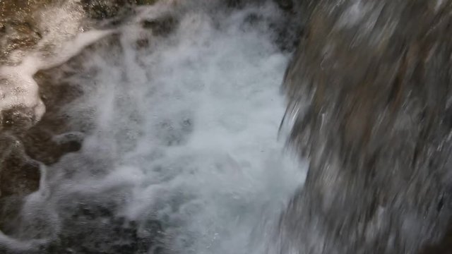fresh water that falls from the waterfall