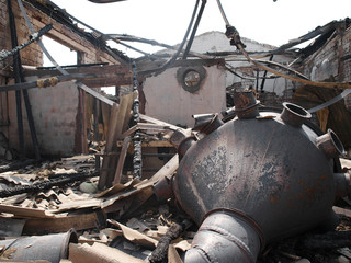 Firefighters extinguish a building
