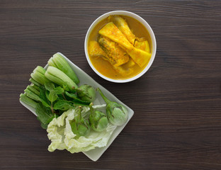 Yellow curry snapper fish with coconut shoots thai food