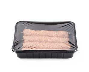 Boxed raw kebab meat isolated