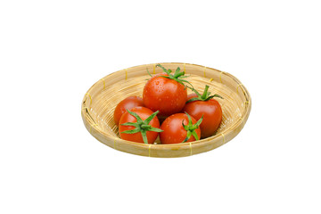 fresh cherry tomato in Bamboo Basket isolated on white backgroun