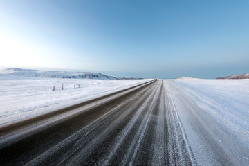 Driving a snowy road on winter iceland