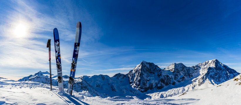 Ski in winter season, mountains and ski touring backcountry equi