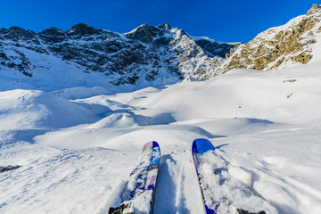 Ski in winter season, mountains and ski touring backcountry equi