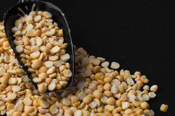 Dry peas on a black background