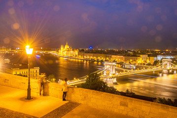 The picturesque view of of the Parliament and the bridge over th