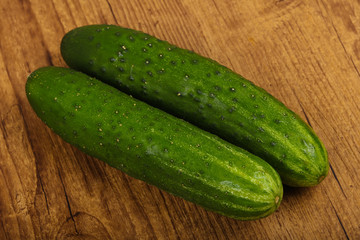 Two green cucumbers