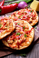 Homemade pizza with chicken meat