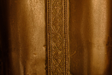 Fototapeta na wymiar Body part of copper Buddha on standing posture at Wat Benchamabophit Buddhism in Bangkok ,Thailand