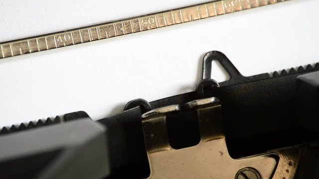 Typing the expression F.A.Q. with an old manual typewriter