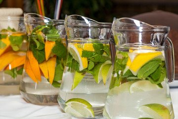 Orange lemonade. Homemade orange lemonade with lemon and mint.