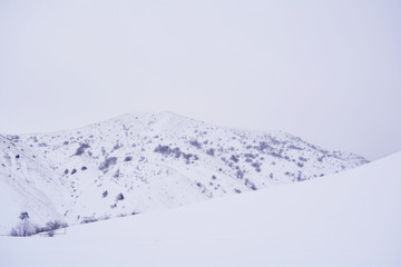 snowy mountain pass © olgatroy1