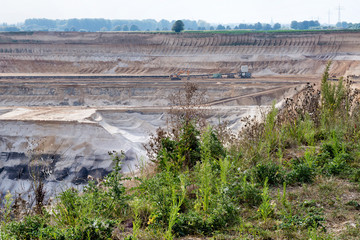 GARZWEILER, GERMANY - SEPTEMBER 01, 2016 : Sccenic view into open cast brown coal mining field with...