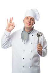 Portrait of a chef that shows hand sign