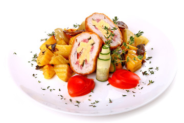 Chicken Kiev with a sliced potatoes
