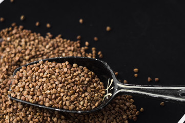 Buckwheat on a black background