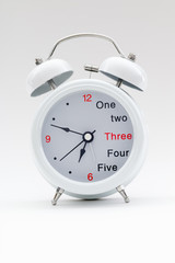 Alarm clock on white background
