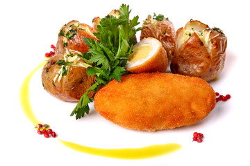 Chicken Kiev with potatoes and parsley