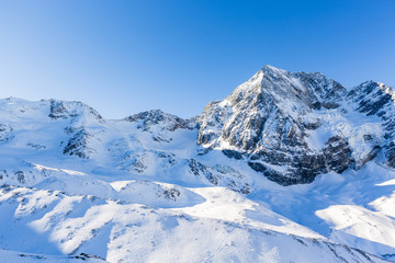Snowy Italian Alps Sulden, Solda with Ortler, Zebru, Grand Zebru in background. Val Venosta, South Tirol, Italy.
