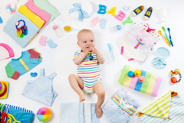 Baby with clothing and infant care items