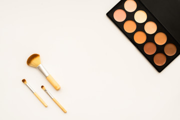 decorative cosmetics on white background top view