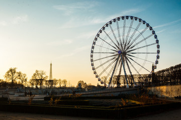 The ferris wheel and the Eiffel Tower in Paris, France