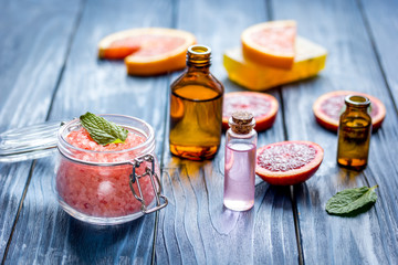 organic cosmetic with citrus on blue background