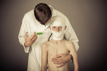 Doctor makin injection in kids neck