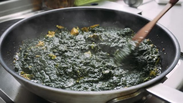 vegetarian dishes Palak paneer. Spinach and paneer in a pan

