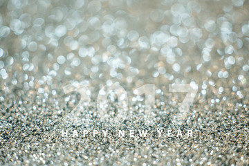 Happy new year 2017 on Festive silver glitter blur bokeh backgro