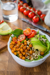 Vegeterian buddha bowl - balanced meat with spinach, chicken pea and avocado