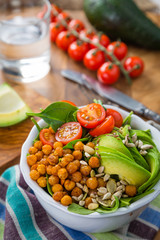 Vegeterian buddha bowl - balanced meat with spinach, chicken pea and avocado