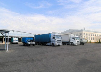trucks and transporter in factory of production useful for background