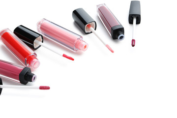 Colorful lip gloss isolated on a white background