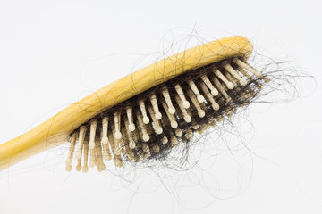 Comb brush with lost hair, Demonstrating health problems.