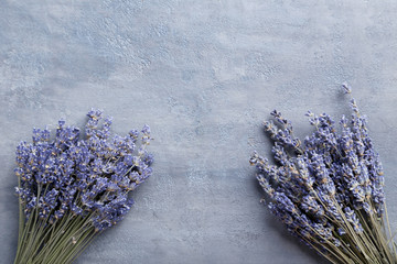 Bunch of lavender flowers on grey background