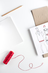 Fototapeta na wymiar desktop designer clothes with tools top view mock up