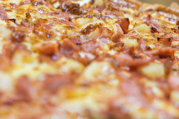 Hawaiian pizza with ham fresh pineapple mozzarella parmesan chee