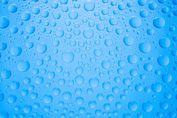 Water drops on blue background