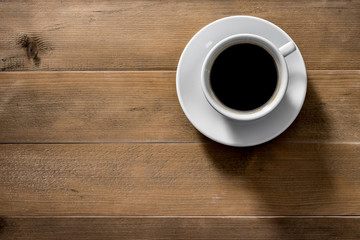 Obraz na płótnie Canvas Hot cup of Americano coffee morning breakfast on classic old vin