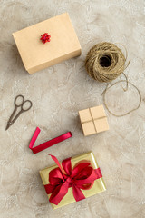 wrapping gifts in box for holiday top view mock up