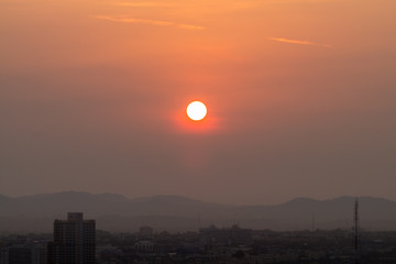 Sunrise over the city is developing.