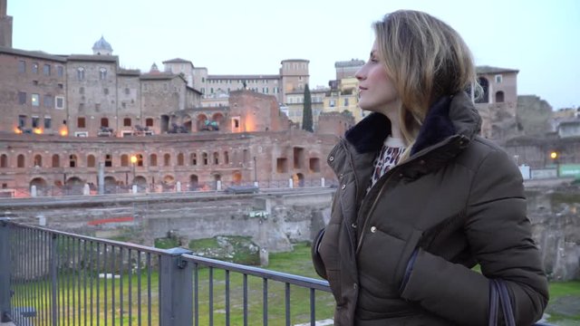 Video of a tourist girl in Ancient Trajan's Market, ruins at Via dei Fori Imperiali, Rome, Italy, Europe