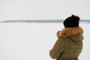 a woman on a winter lake