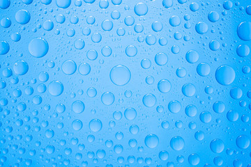 Water drops on blue background