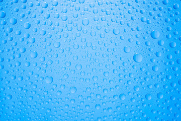 Water drops on blue background