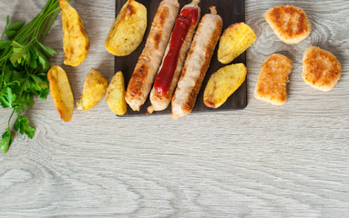 grilled sausages and nuggets and chips for lunch. The concept of harmful food