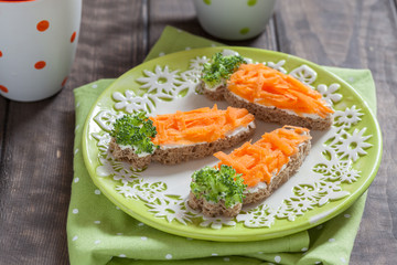 Funny toasts in a carrots shape