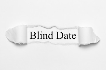 Blind Date on white torn paper